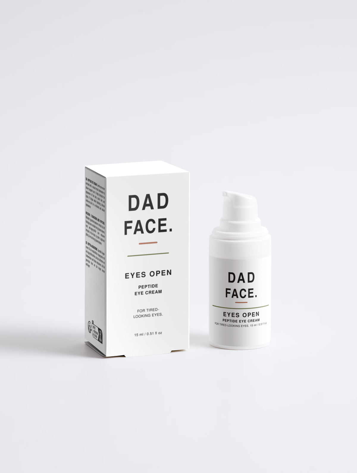 Dad Face Eyes Open Puffing Eye Cream shown with its white packaging box and matching white pump bottle on a clean light gray background.